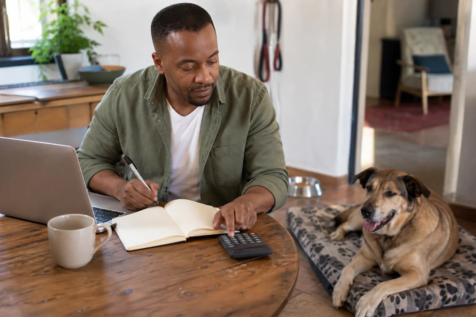 Dog owner planning a household dog budget